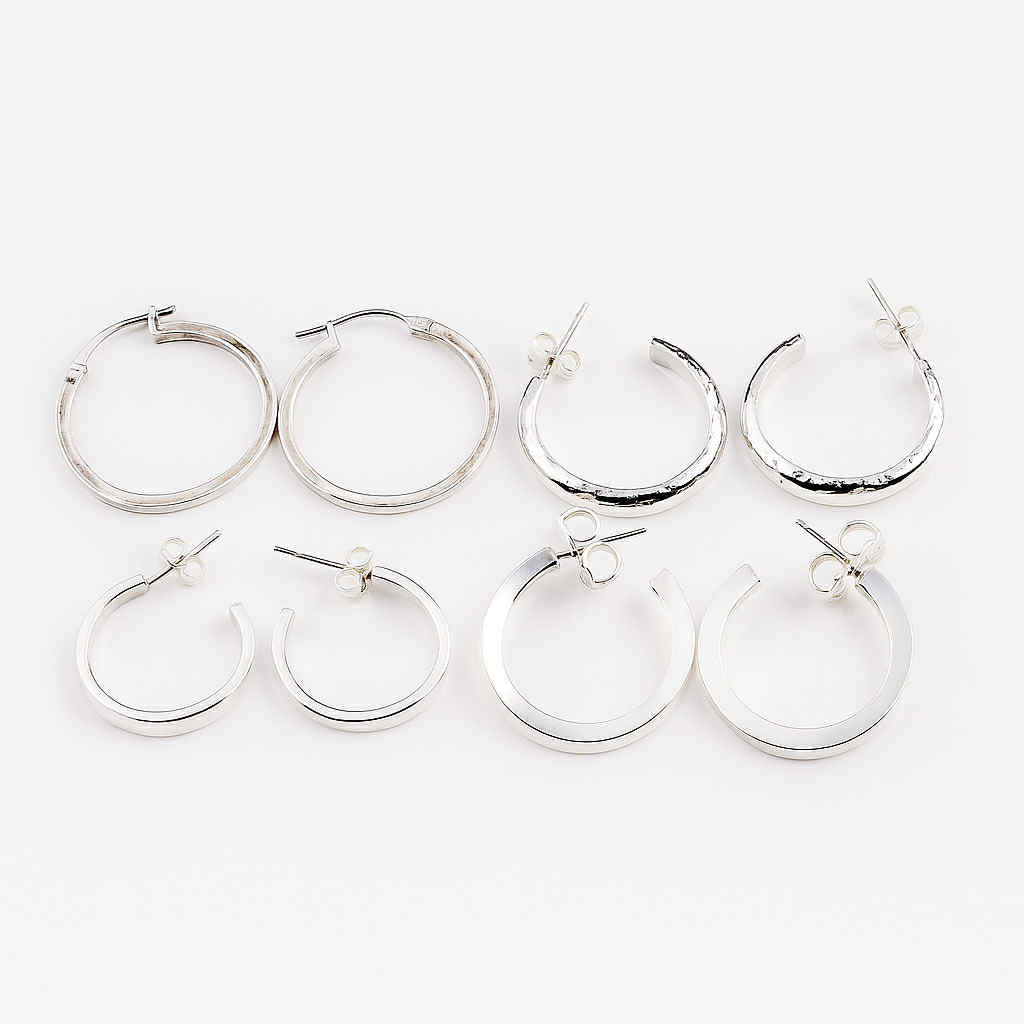 Handcrafted Sterling Silver hoop earrings and pendants featuring Water Cast Pearls from the Winter Magic collection.