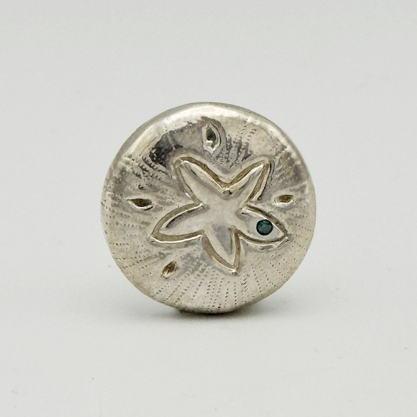 Sterling Silver Sand Dollar Pendant With Blue Diamond